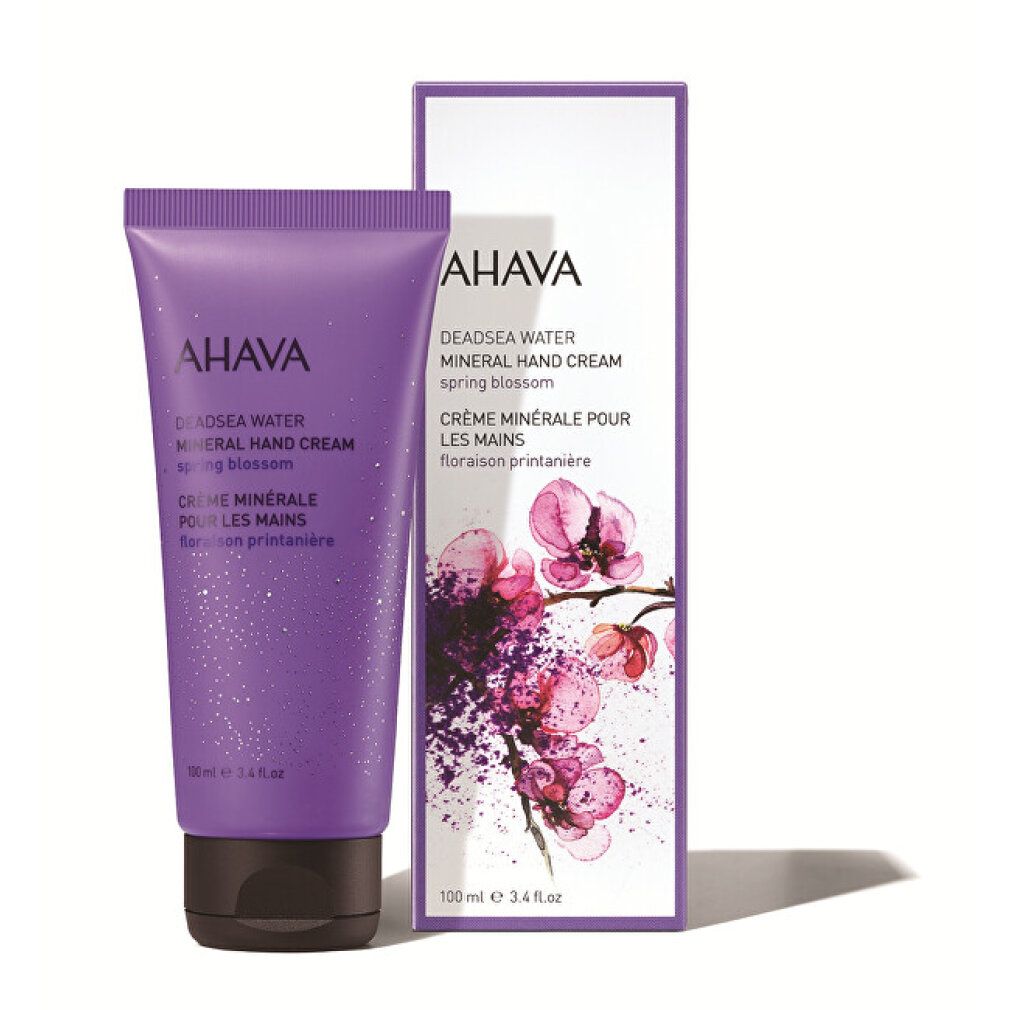 Tubo e scatola AHAVA Mineral Hand Cream con fiori.