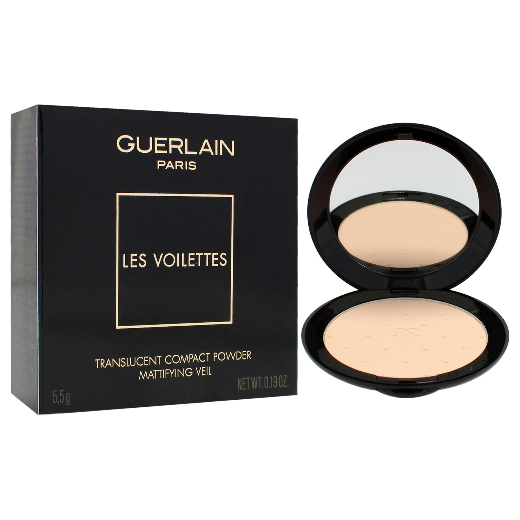 Cipria compatta con specchio. Astuccio nero aperto. Cipria beige chiaro. Testo: Guerlain, Les Voilettes, Translucent Compact Powder, Mattifying Veil.