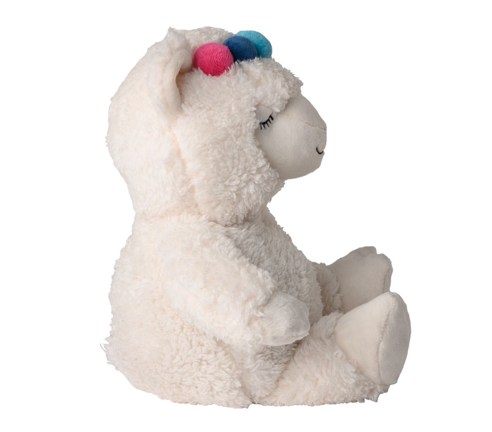 Peluche alpaca bianco di profilo, con occhi chiusi e pompon colorati sulla testa.