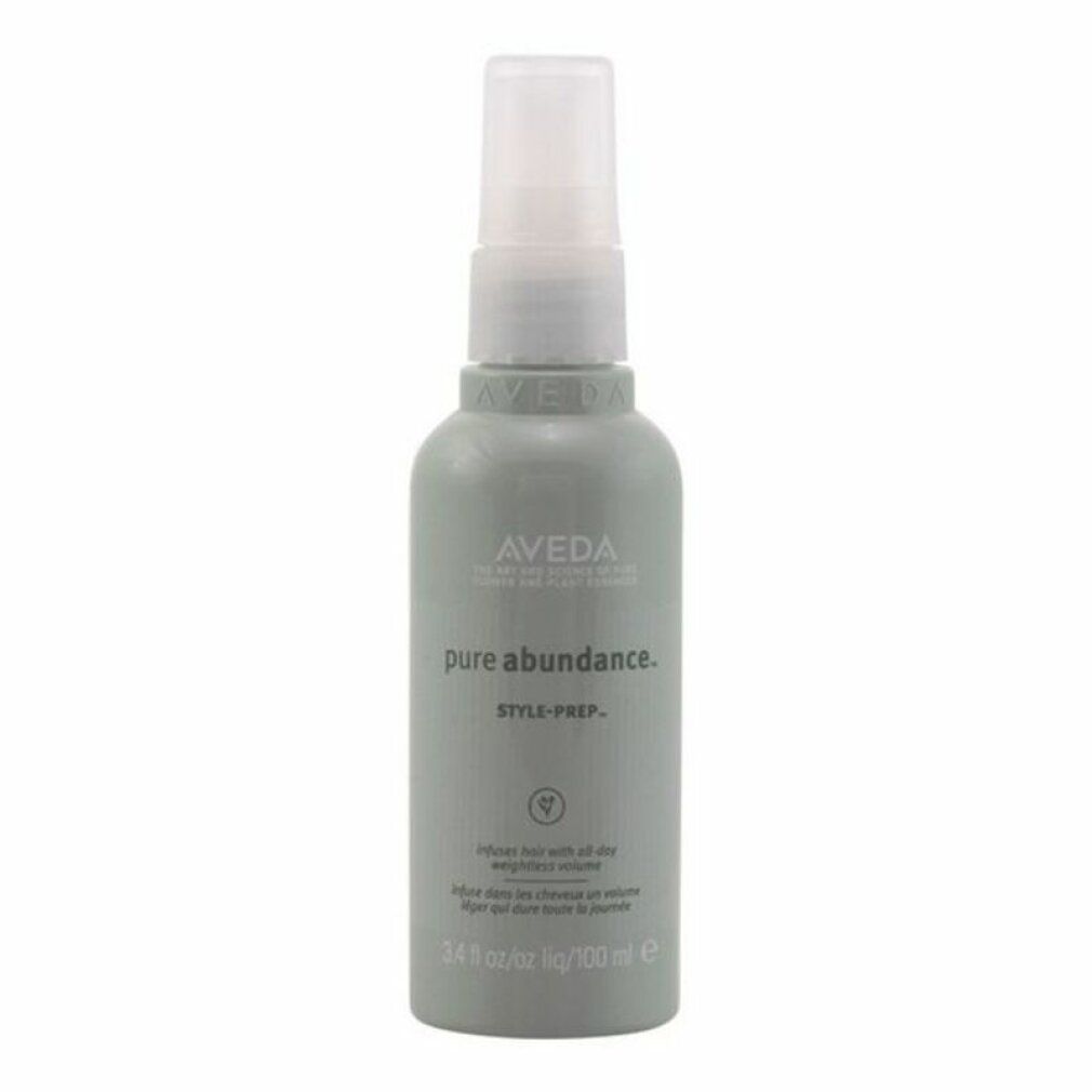 Flacone grigio con vaporizzatore bianco. Scritta: Aveda, pure abundance, Style-Prep. Testo: Infuse hair with all-day weightless volume.