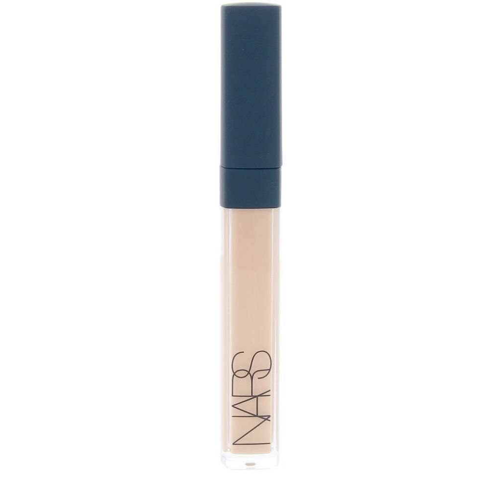 Tubo correttore con tappo blu. Tubo trasparente con prodotto. Scritta bianca NARS.