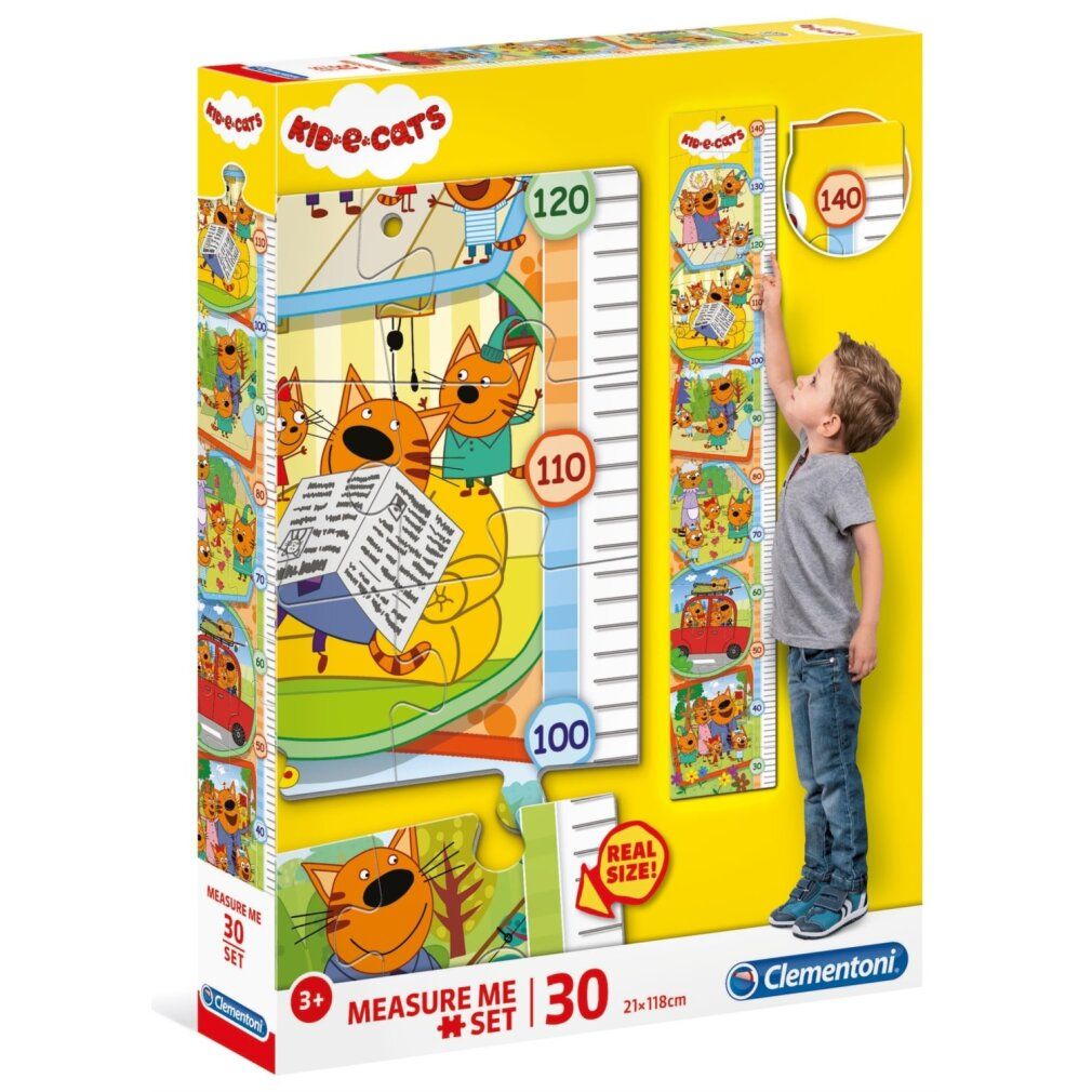 Puzzle con motivo di gatti e metro. Confezione con nome del prodotto e raccomandazione di età. Bambino in piedi accanto al metro.