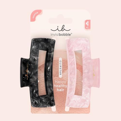 Due fermagli per capelli neri e rosa, su confezione. Marchio: Invisibobble Clipstar.