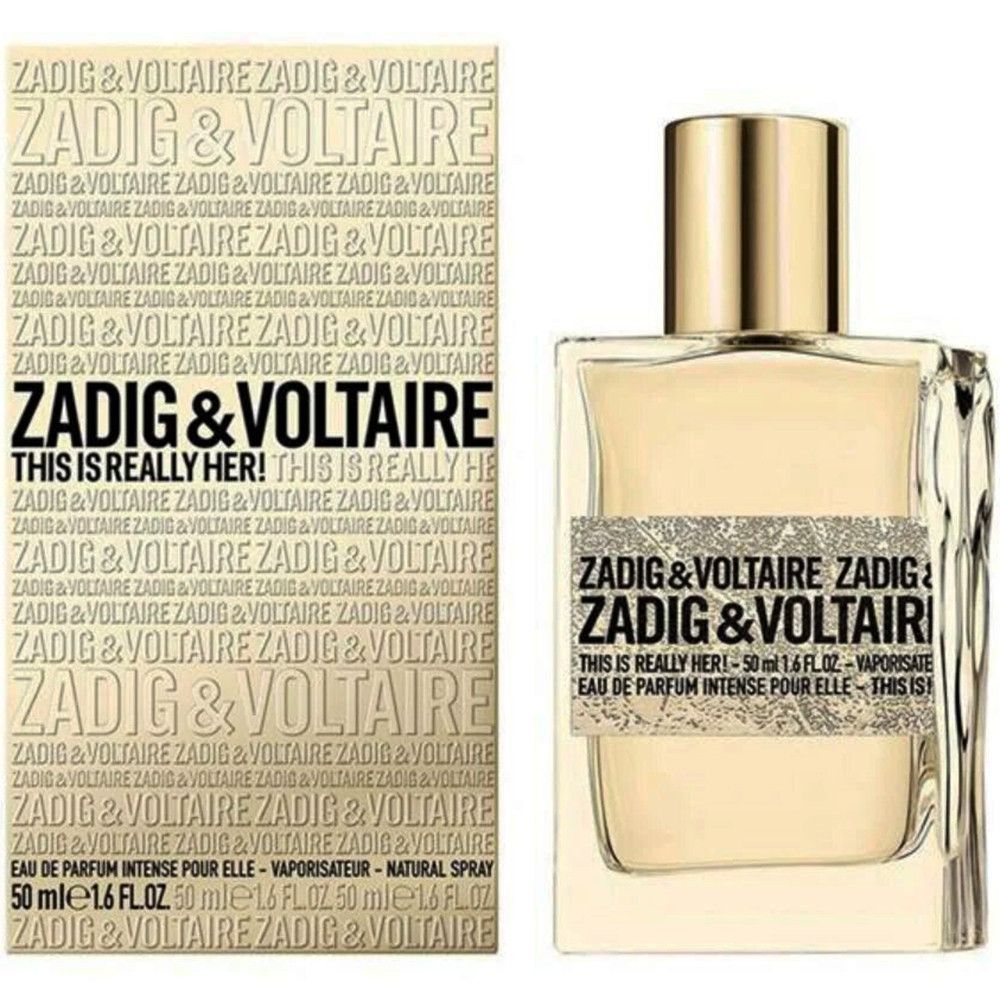 ZADIG & VOLTAIRE Eau de Parfum con confezione. Flacone e scatola. Scritta: THIS IS REALLY HER! e nome del marchio. Tappo dorato.