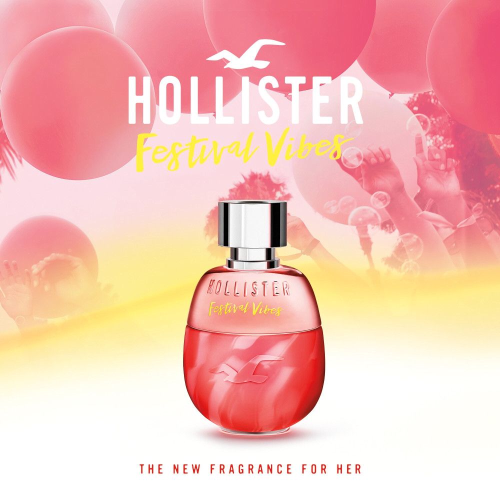 Flacone rosso con tappo argentato. Scritta: Hollister Festival Vibes. Sfondo: palloncini rosa e figura.