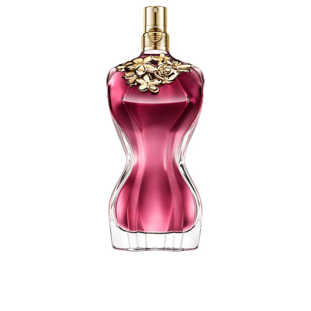 Flacone rosso a forma di corpo femminile, tappo dorato. Decorazione di rose sul collo. Base in vetro trasparente.