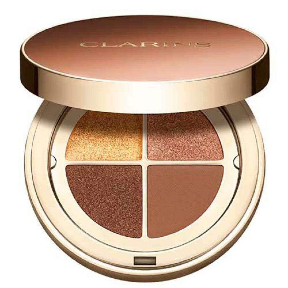 Palette ombretti rotonda, quattro colori. Coperchio dorato con scritta Clarins. Tonalità: oro, marrone, marrone scuro, marrone chiaro.