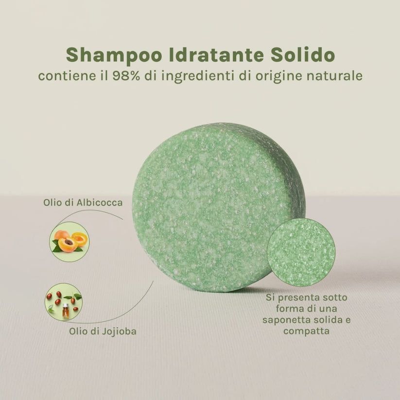 Panetto shampoo verde rotondo. Testo: Shampoo Idratante Solido, 98% ingredienti naturali. Vegano.