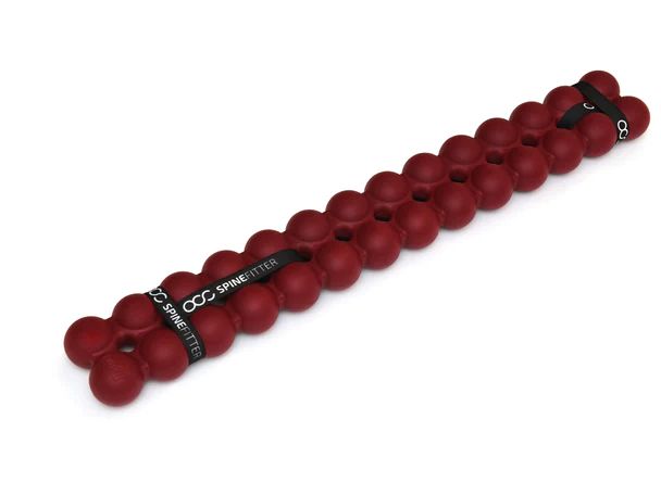 Spinefitter rosso con fascia nera. Elementi sferici. Marchio SISSEL.