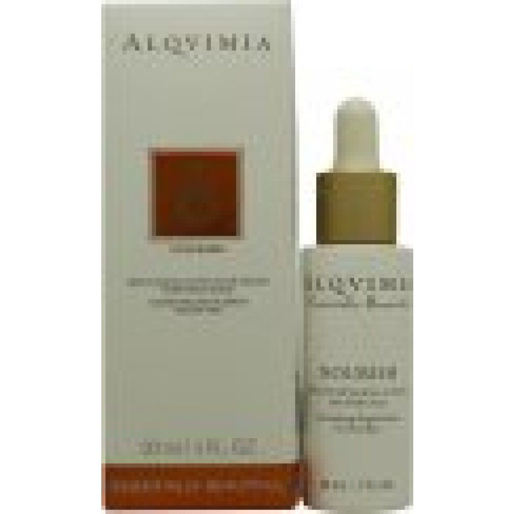 Scatola bianca con flacone di siero. Flacone con tappo dorato e pipetta. Scritta: NOURISH, 30 ml / 1 Fl. Oz.