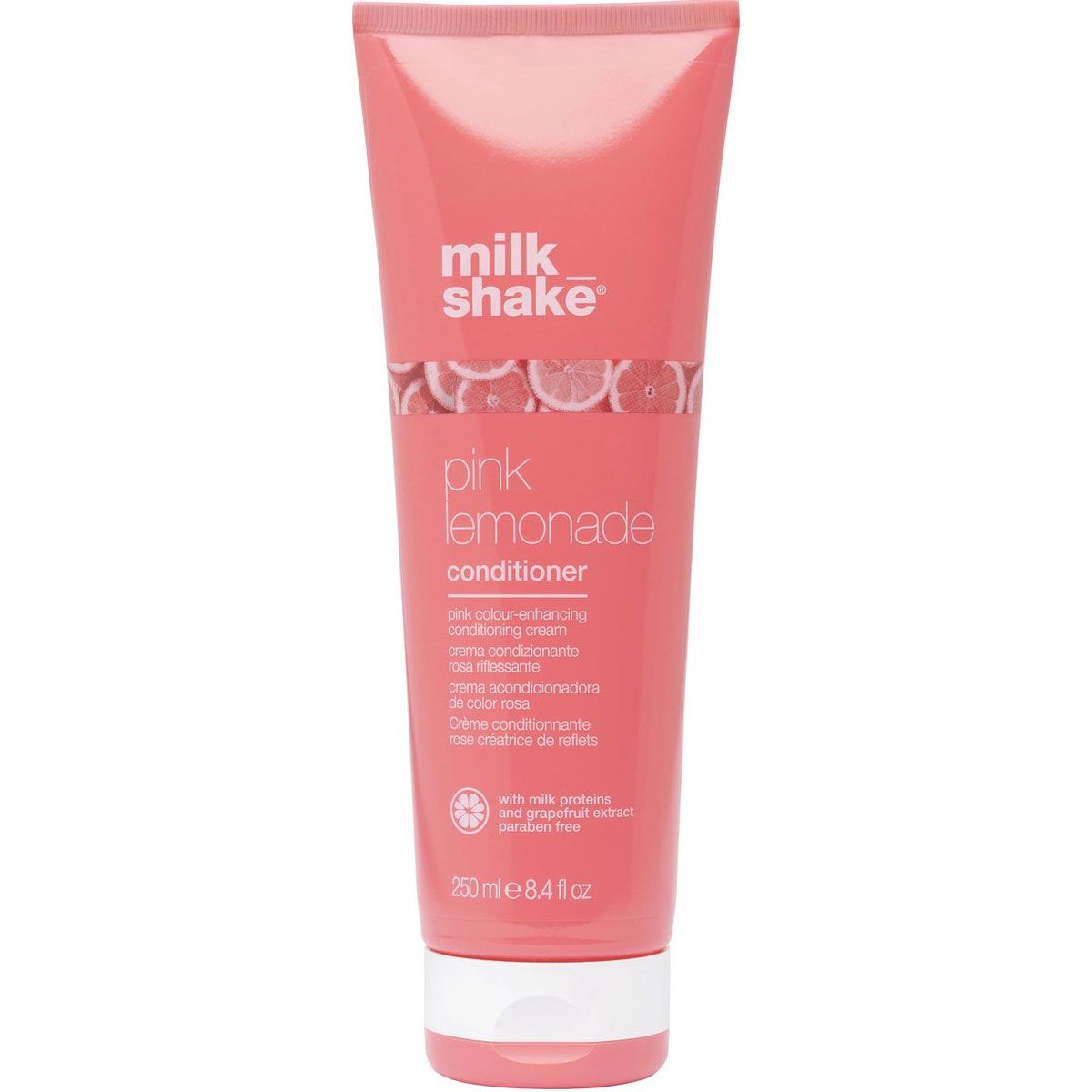 Flacone rosa Milk_Shake Pink Lemonade Conditioner con tappo bianco e agrumi.