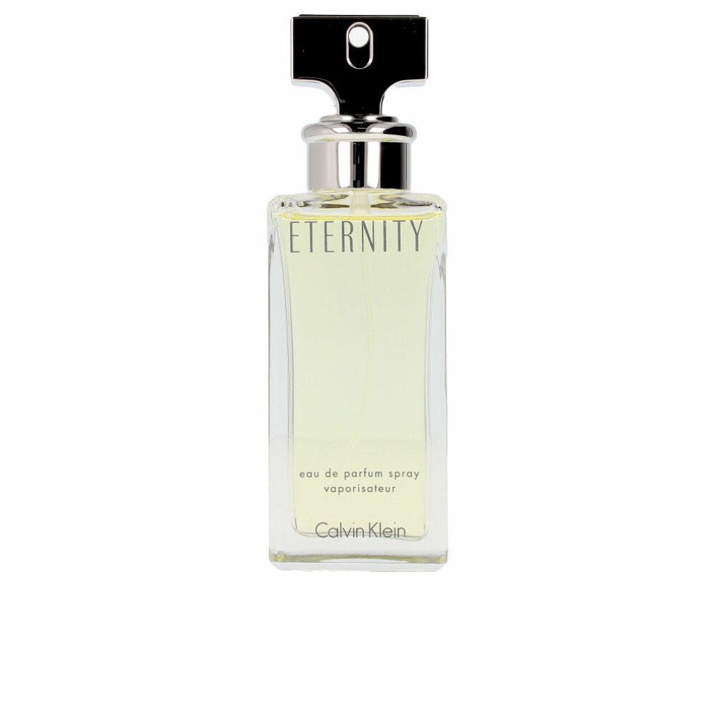 Flacone rettangolare con tappo argentato. Scritte "Eternity" e "Calvin Klein".