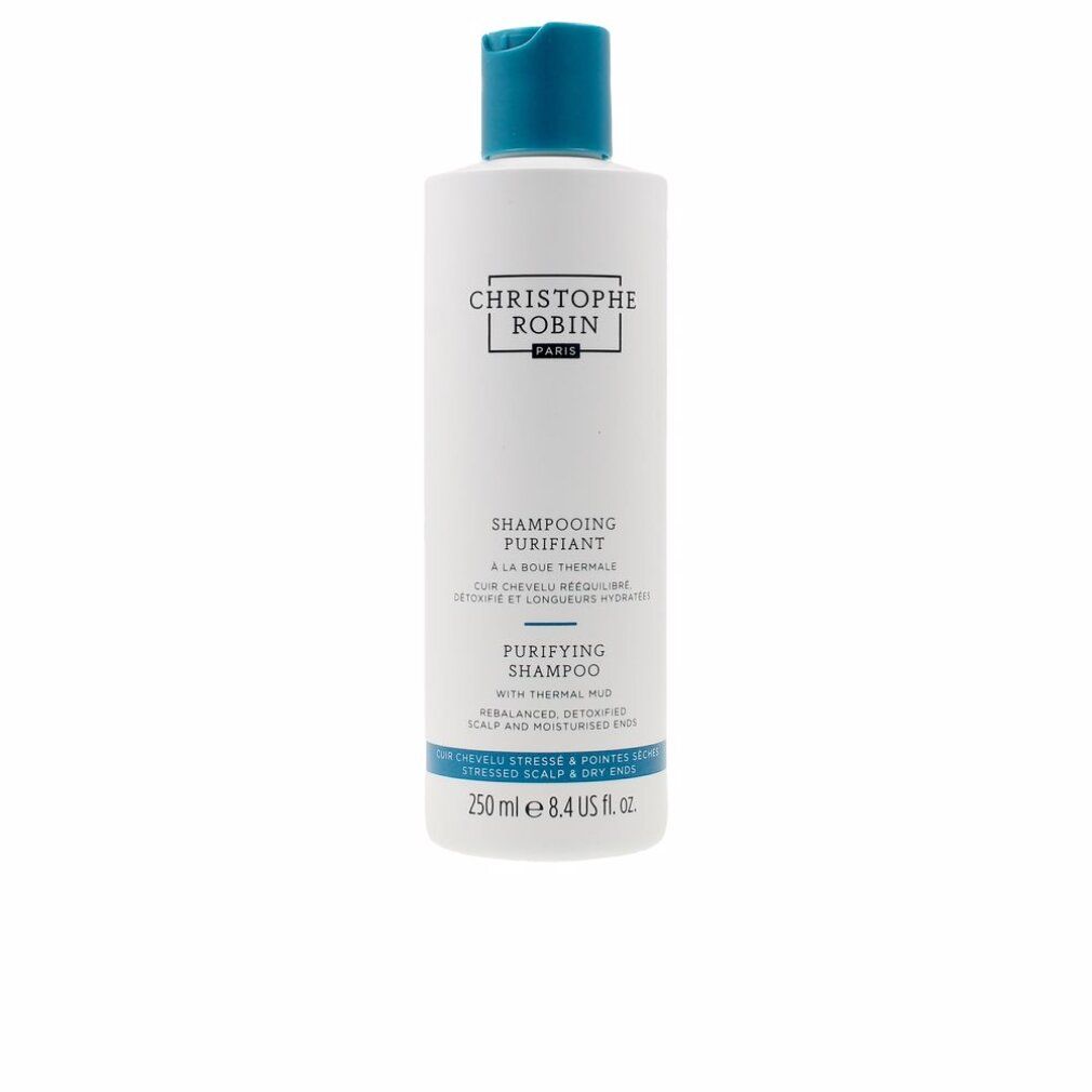 Flacone di shampoo bianco con tappo blu. Testo: Christophe Robin, Purifying Shampoo, con fango termale. 250 ml.