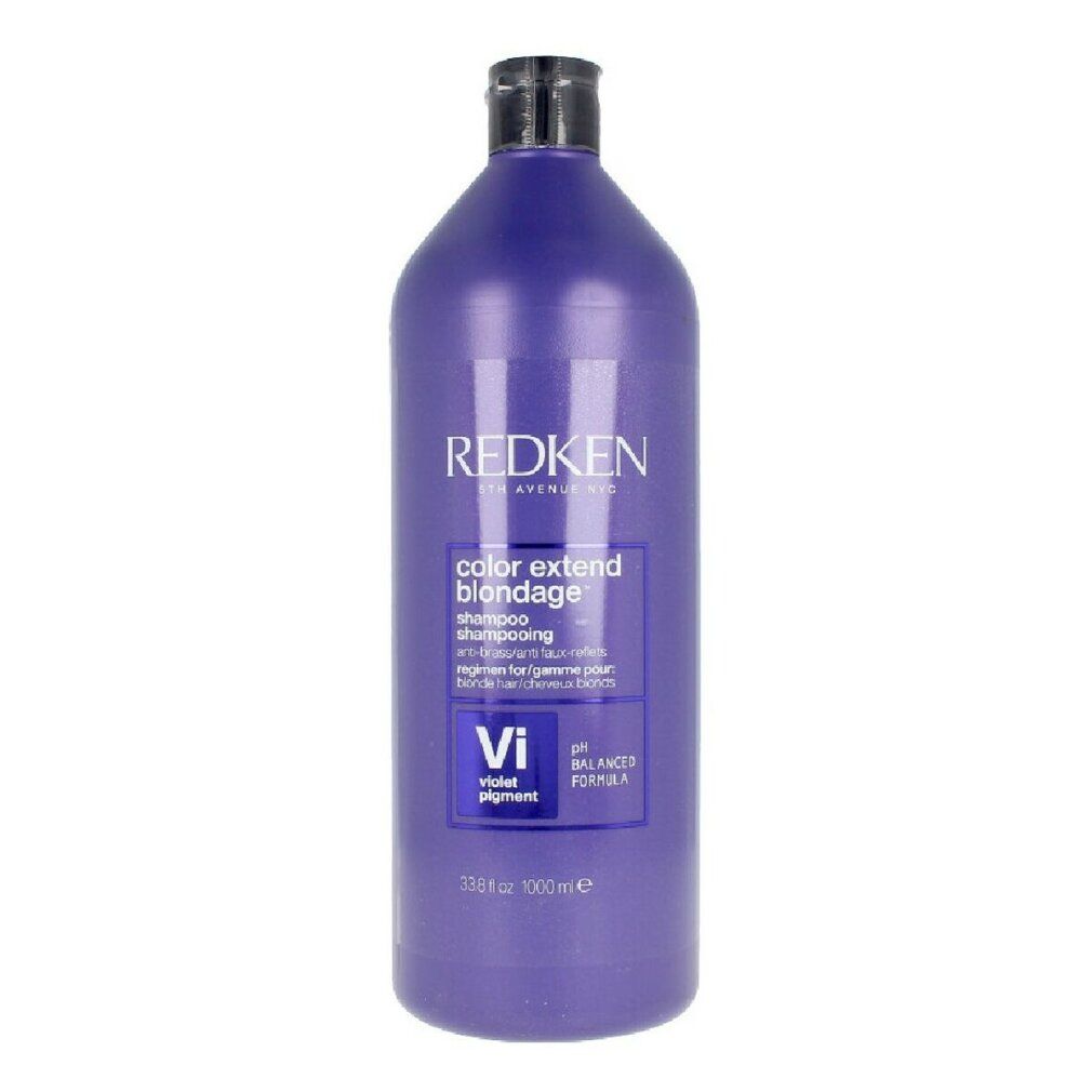 Shampoo viola Redken. Bottiglia con tappo nero. Scritta: Color Extend Blondage. Formula pH bilanciata.