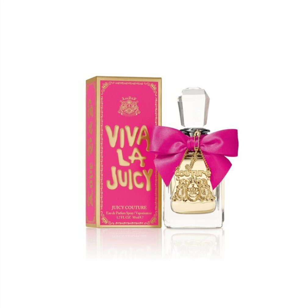 Flacone di profumo e scatola. Flacone con fiocco rosa. Scatola rosa con scritta dorata.