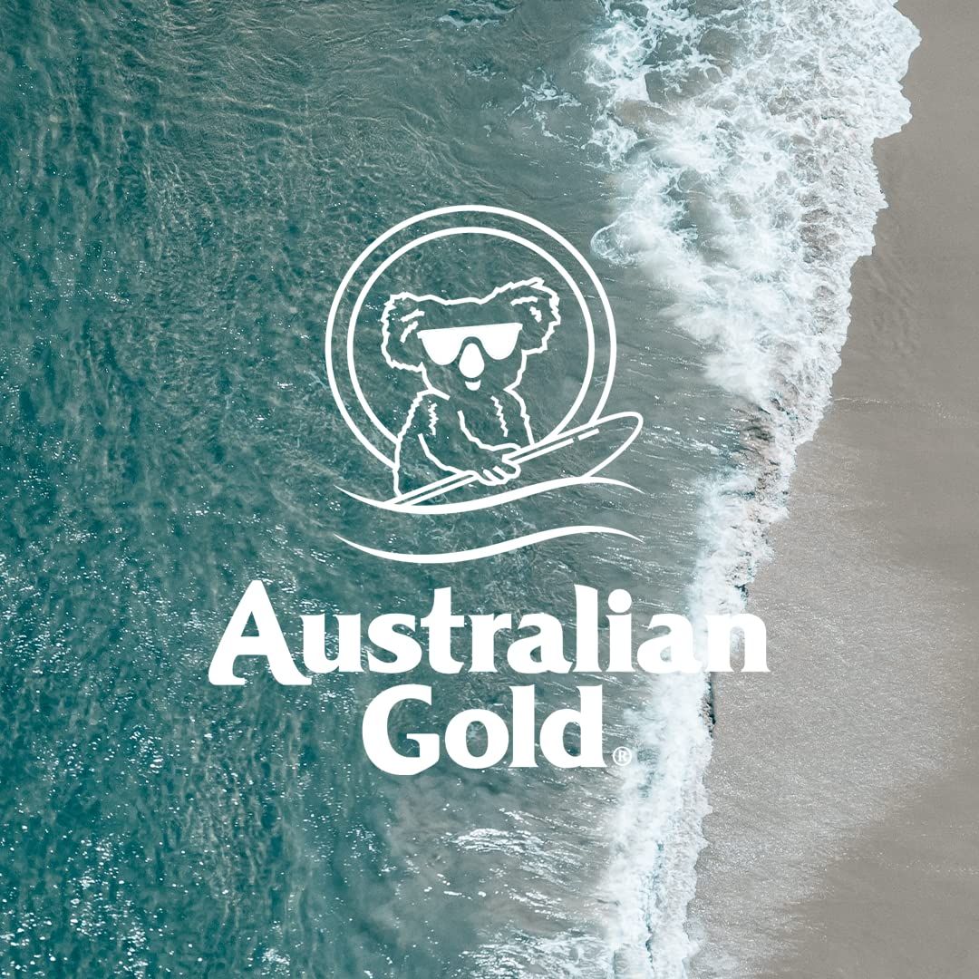 Logo di Australian Gold. Koala con occhiali da sole su tavola da surf. Onde e mare sullo sfondo. Testo: Australian Gold.