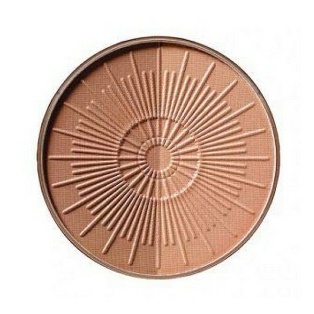 Ricarica bronzer rotonda. Colore abbronzato con motivo a raggi solari. Bordo marrone.