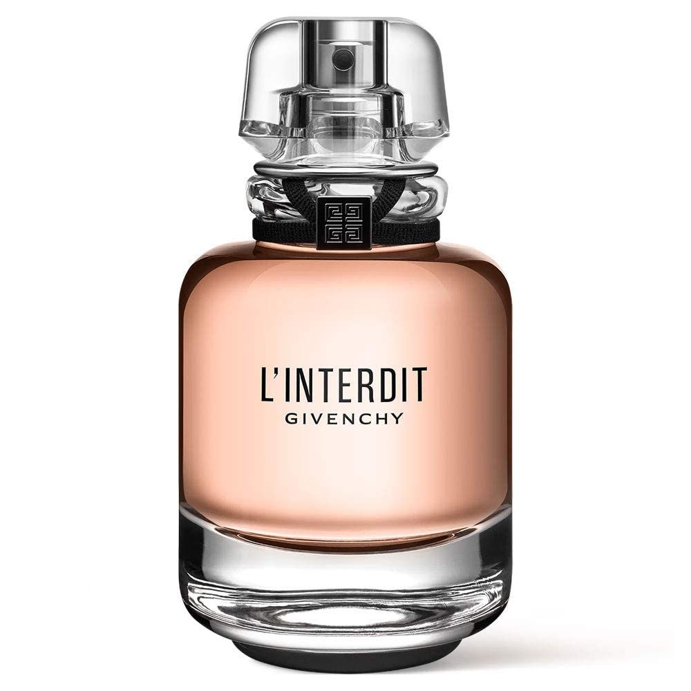Flacone di profumo con tappo trasparente. Scritta: L'Interdit Givenchy. Liquido rosa in flacone di vetro.