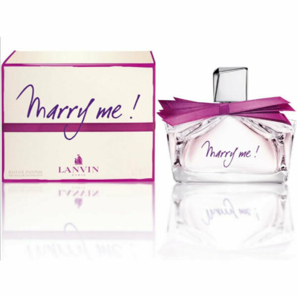 Flacone di profumo e scatola. Flacone con fiocco e scritta. Scatola con scritta e logo.