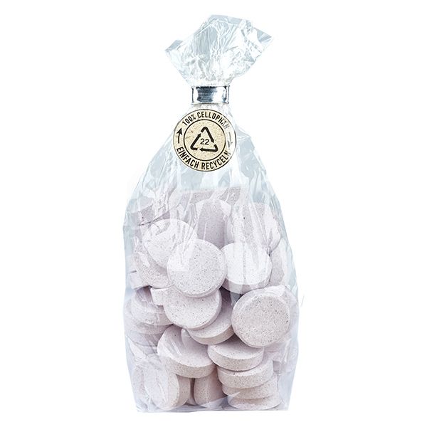 Sacchetto di compresse rotonde e chiare. Imballaggio trasparente, con sigillo e stampa.