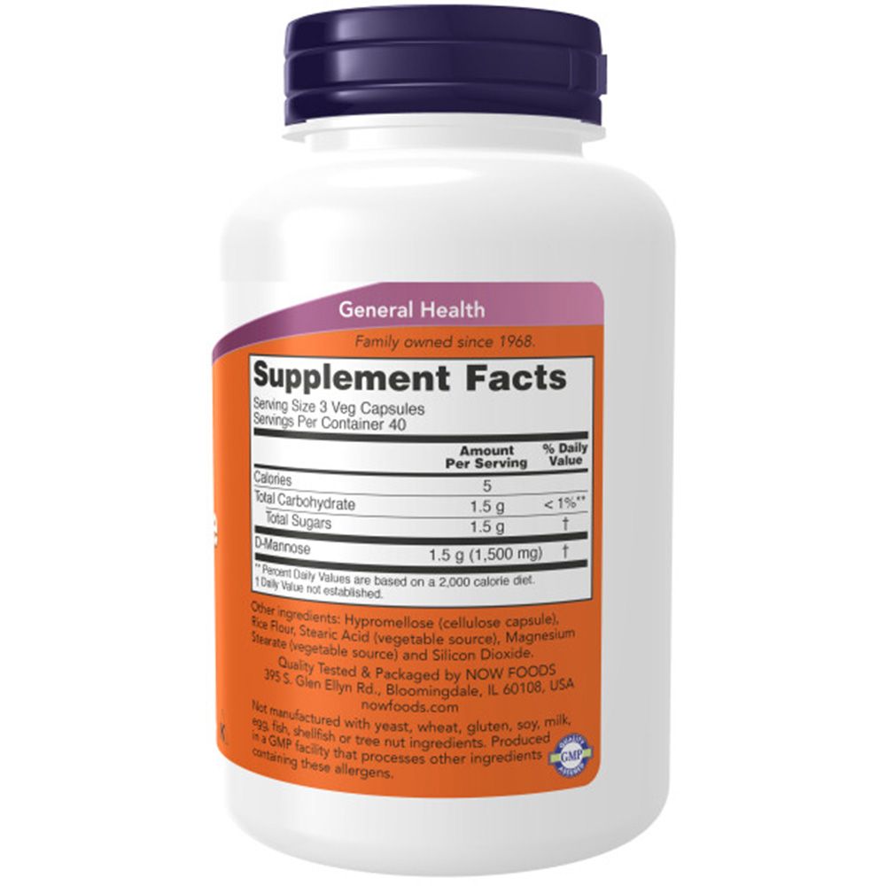 Flacone bianco con tappo viola. Etichetta con informazioni sul prodotto, tra cui "D-Mannose 1,5 g". Marchio: NOW Foods.