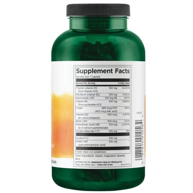 Retro di un flacone verde. Etichetta bianca con informazioni nutrizionali. Contiene complesso di vitamina B. Elenco ingredienti e informazioni produttore.