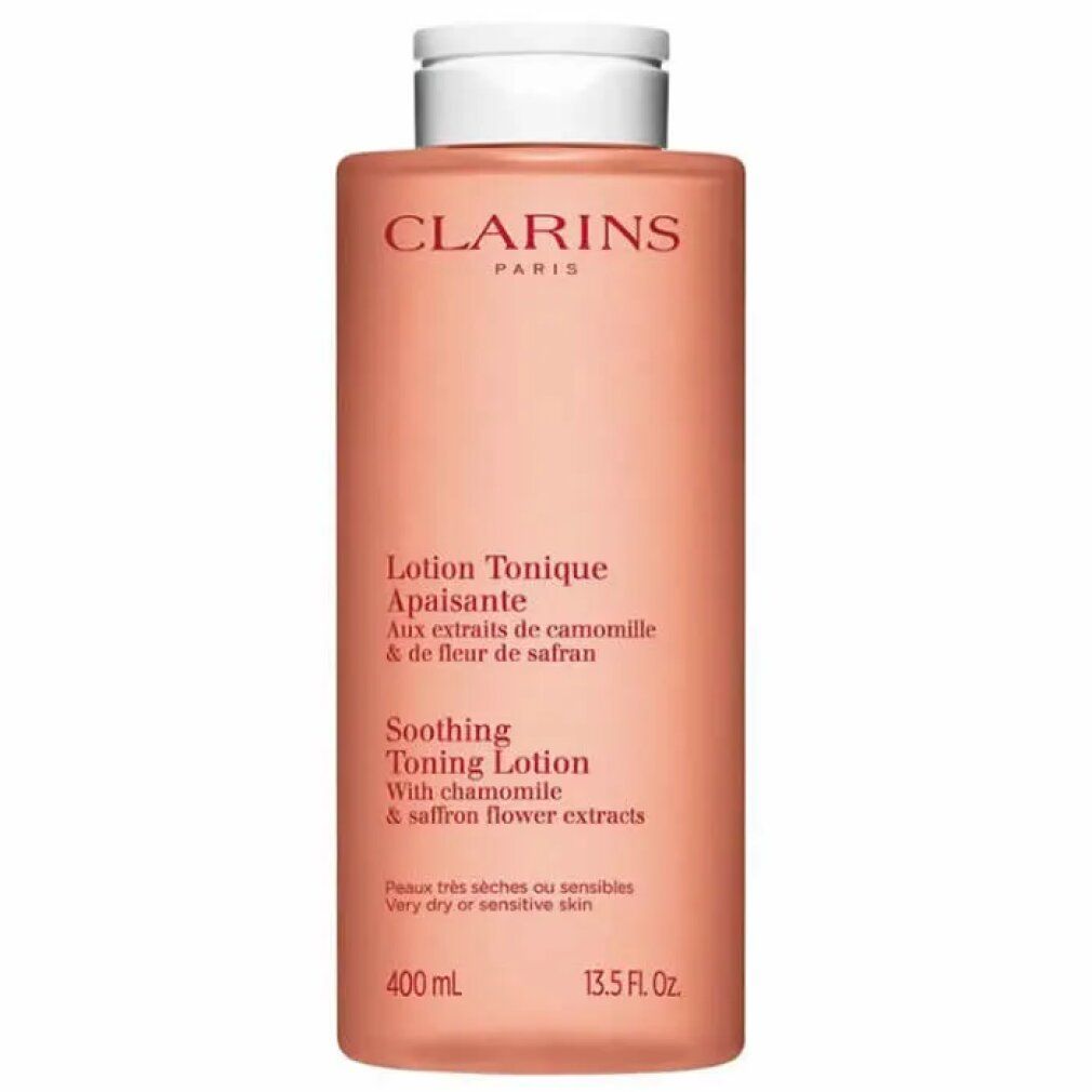 Flacone rosa con tappo bianco. Scritta: CLARINS PARIS. Testo: Lotion Tonique Apaisante. Con camomilla e fiori di zafferano. 400 ml.