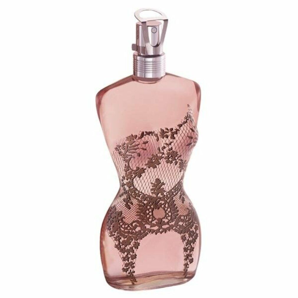 Flacone di profumo a forma di corpo femminile, rosa. Decorazione in pizzo sul davanti. Vaporizzatore argentato.