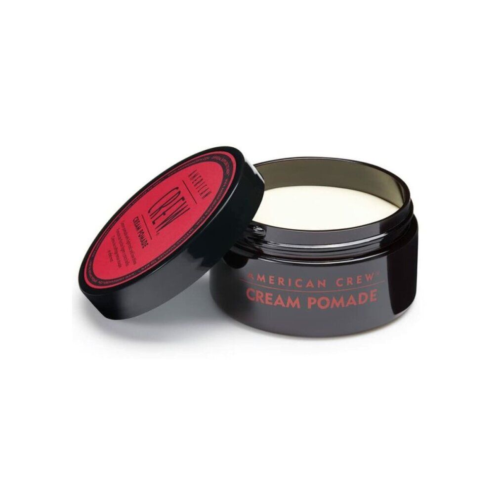 American Crew Cream Pomade in barattolo nero con coperchio rosso.