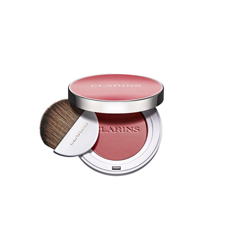 Fard Clarins Joli Blush, cipria compatta rotonda con pennello e applicatore. Coperchio con scritta Clarins. Tonalità rosa.