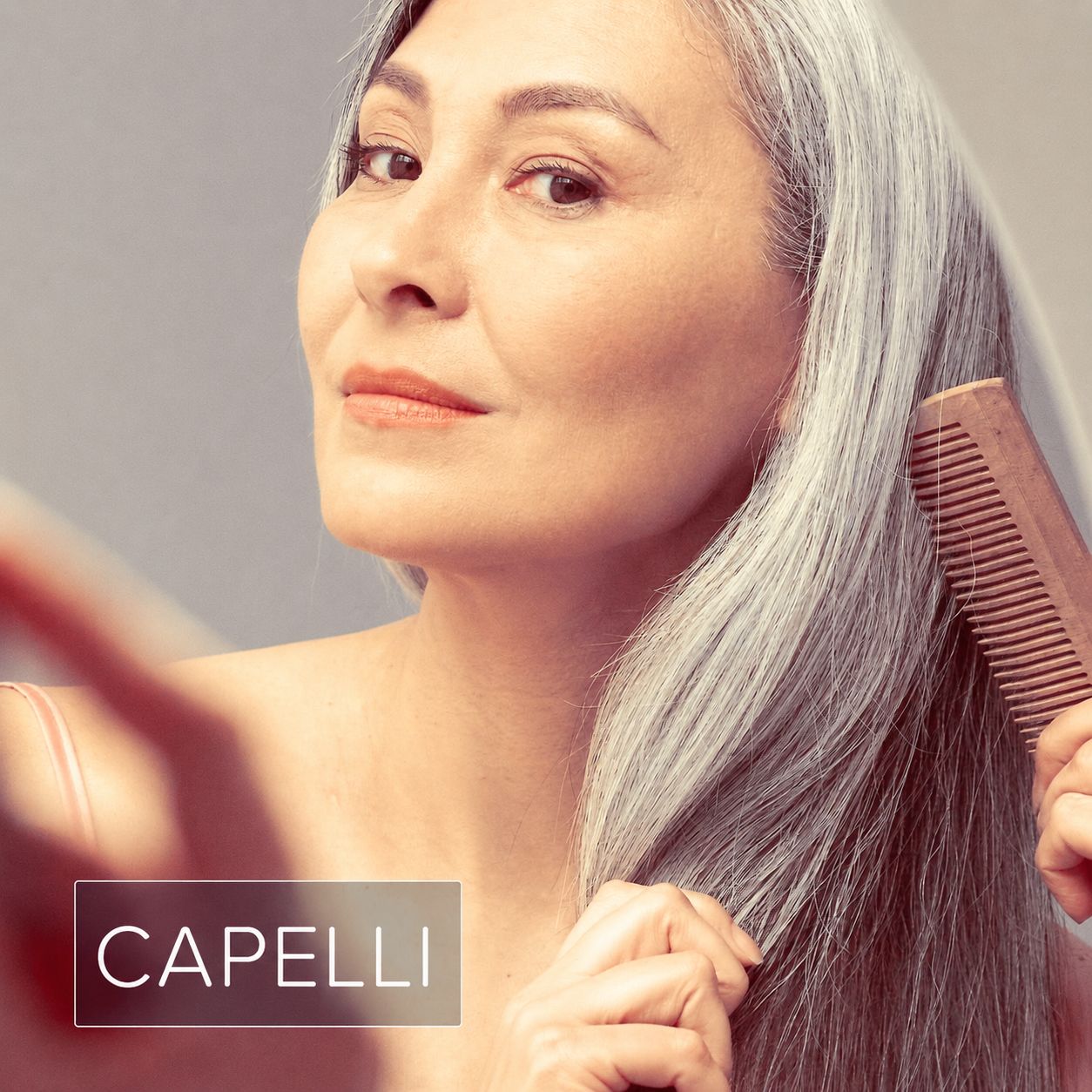 Donna che si pettina. Testo: CAPELLI.