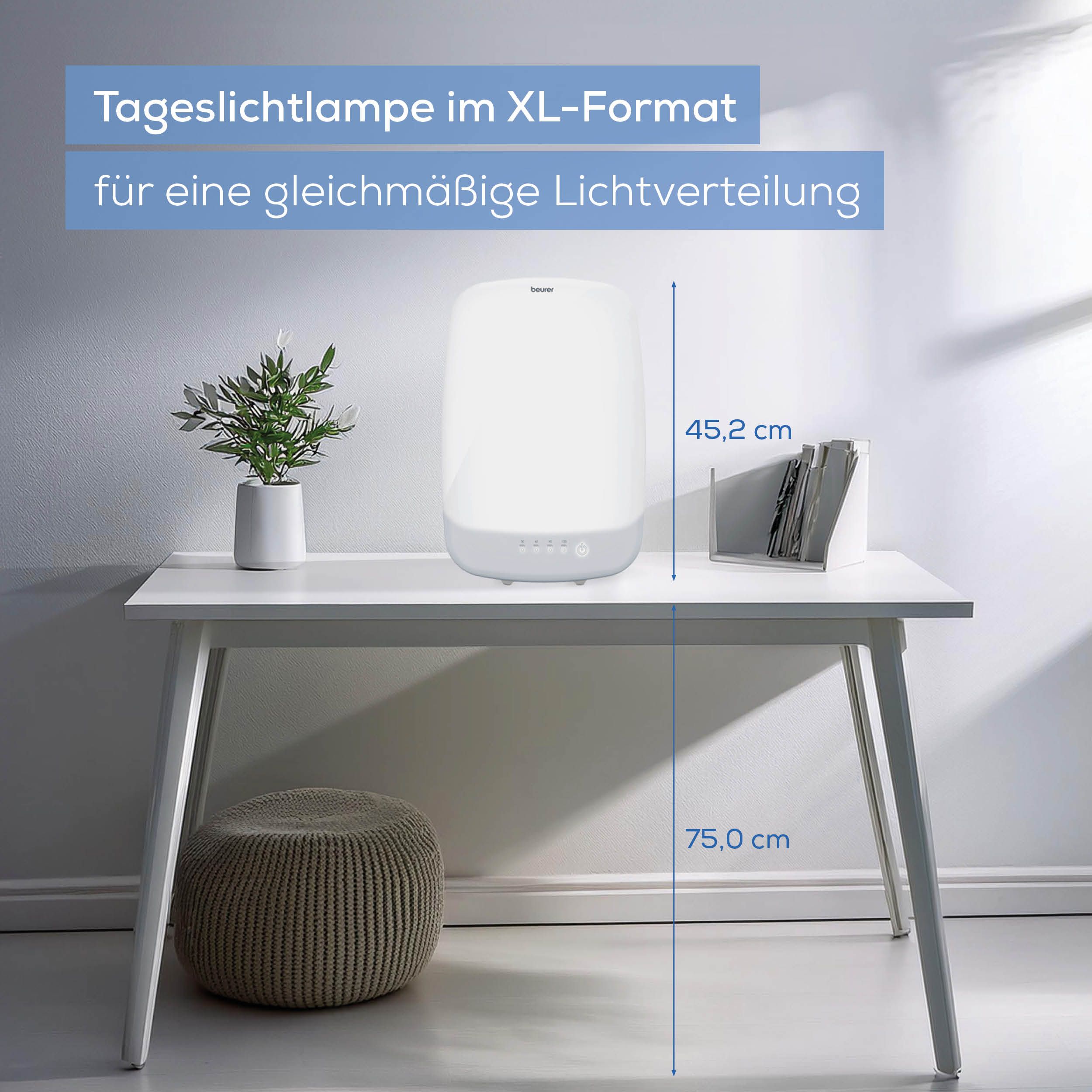 Lampada per la luce su un tavolo. Testo: Lampada per la luce formato XL. Dimensioni: 75,0 cm x 45,2 cm.