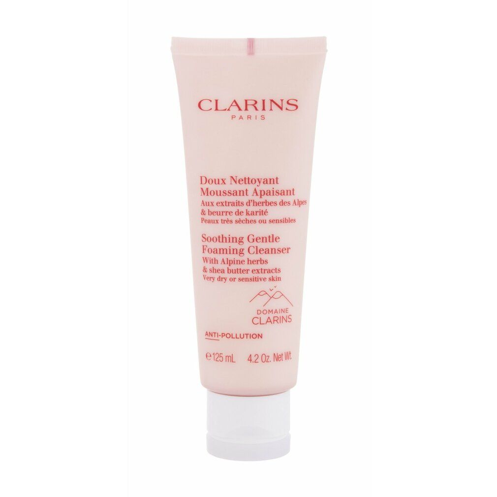 Tubo rosa con tappo bianco. Testo: Clarins Paris, Doux Nettoyant Moussant Apaisant, Soothing Gentle Foaming Cleanser. Anti-Pollution.