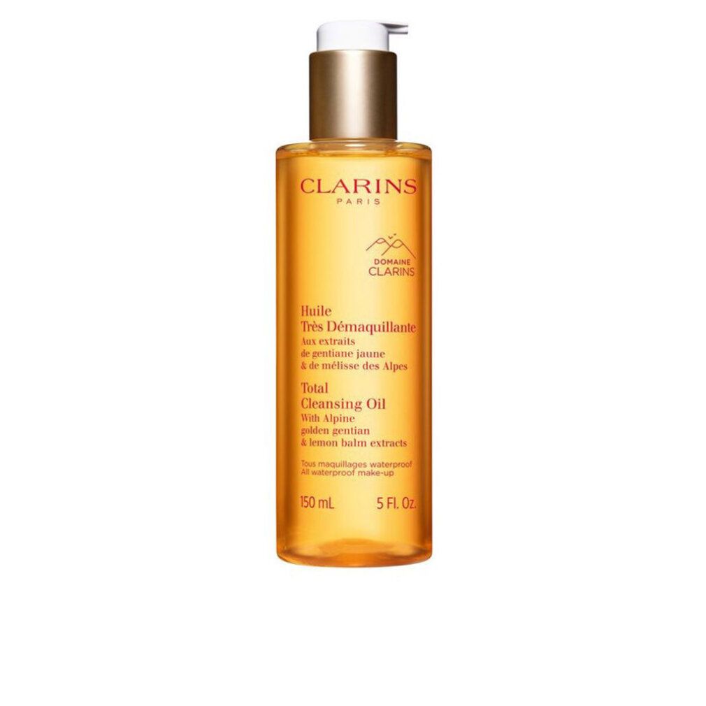 Clarins Total Cleansing Oil. Flacone giallo con dosatore. Testo: Huile Très Démaquillante, Total Cleansing Oil, Anti-Pollution. Marchio Clarins.