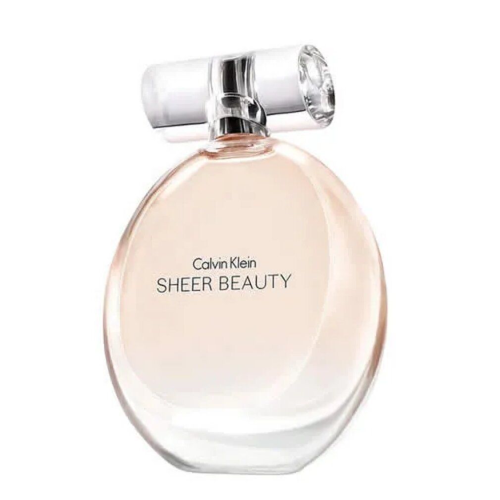 Flacone rotondo con liquido rosa. Tappo trasparente. Scritta Sheer Beauty.