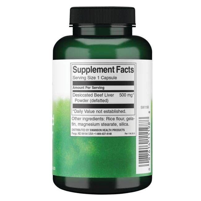 Retro del flacone verde. Etichetta con informazioni nutrizionali. Contiene fegato di manzo essiccato. Elenco ingredienti.