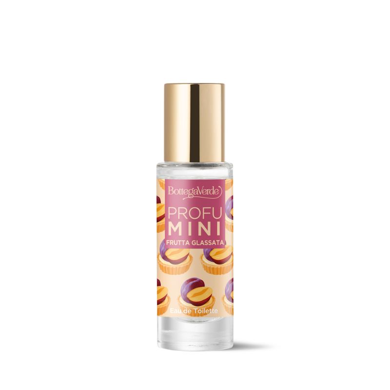 Piccola bottiglia in vetro con tappo dorato, etichettata "Profumi Mini Frutta Glassata" e decorata con frutta candita.