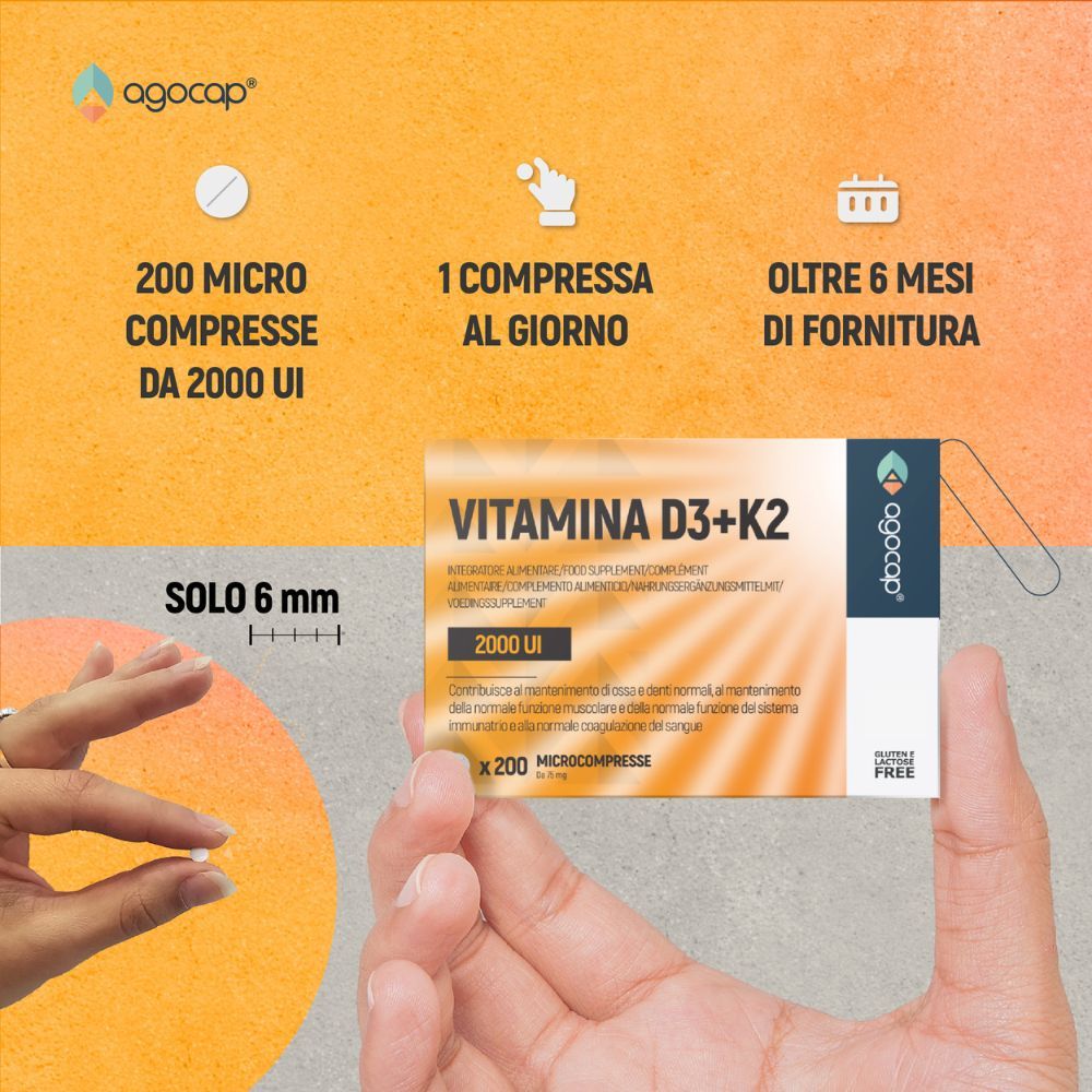 Mani che tengono una compressa e una confezione di Vitamina D3+K2. Testo: 200 Microcompresse da 2000 UI, 1 compressa al giorno, oltre 6 mesi di fornitura.