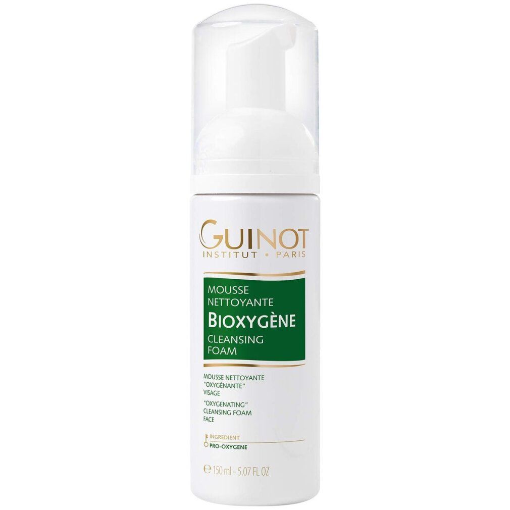 Flacone bianco con erogatore. Scritte: Guinot, Mousse Nettoyante Bioxygene, Cleansing Foam. Dettagli verdi e oro.