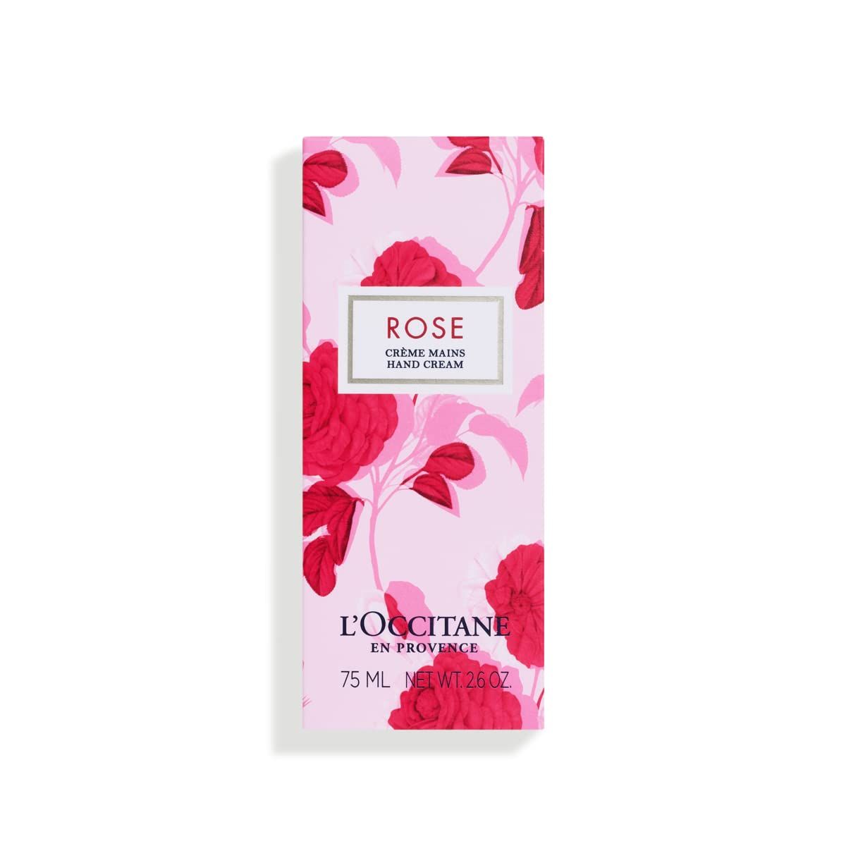 Confezione della crema mani con motivo floreale. Scritta "Rose Crème Mains Hand Cream" e "L'Occitane en Provence".