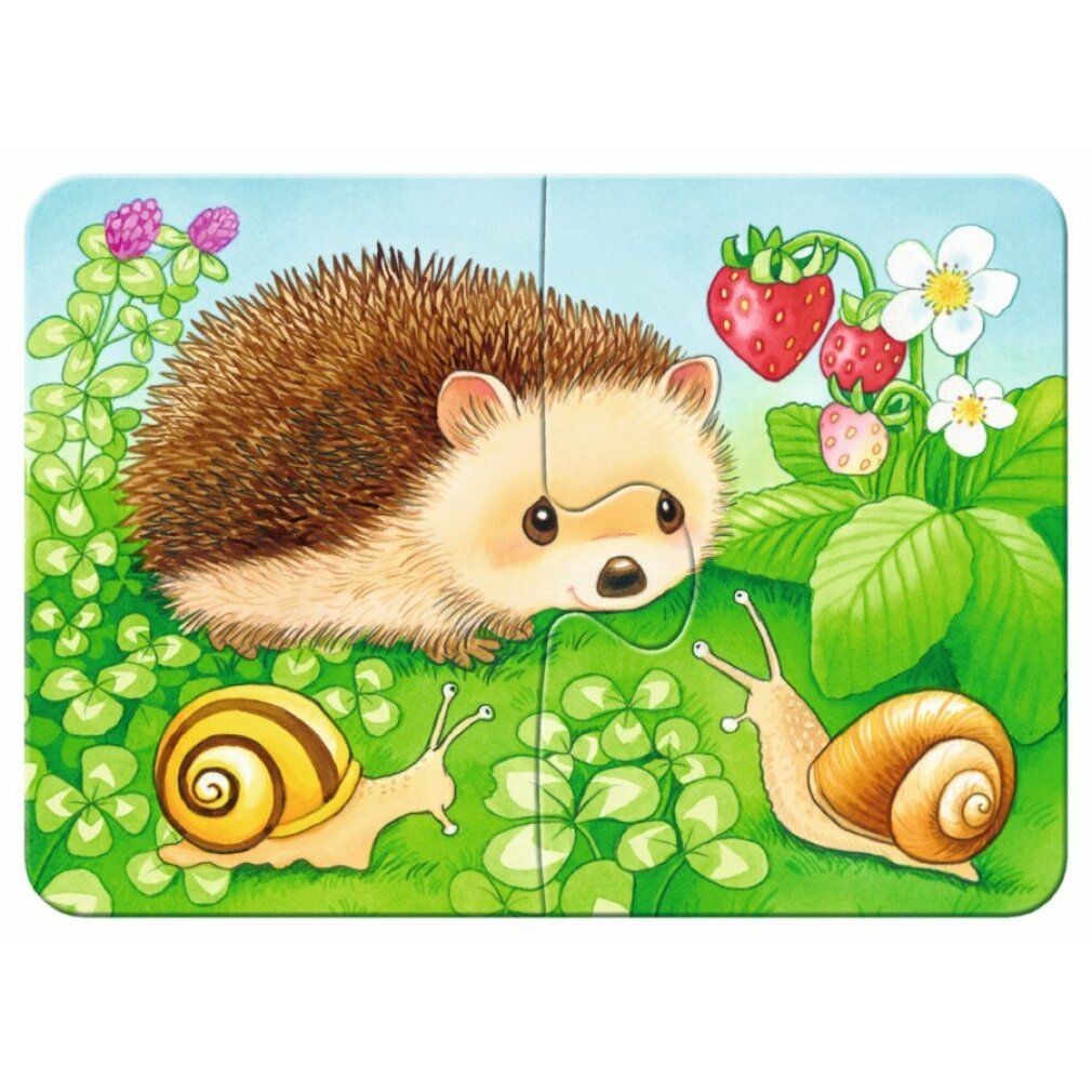 Puzzle con uccello e coccinella. 6 pezzi. L'uccello è su un ramo, una coccinella è visibile.