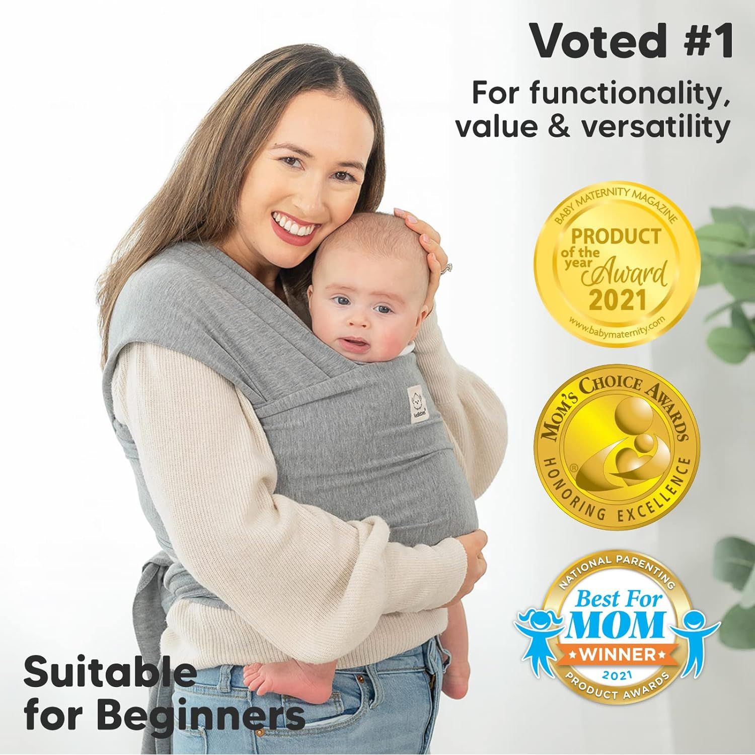 Fascia porta bebè KeaBabies grigia, premiata. Adatta ai principianti. La madre tiene il bambino nella fascia. Premi: Product of the Year 2021, Mom's Choice Awards, Best For Mom Winner 2021.