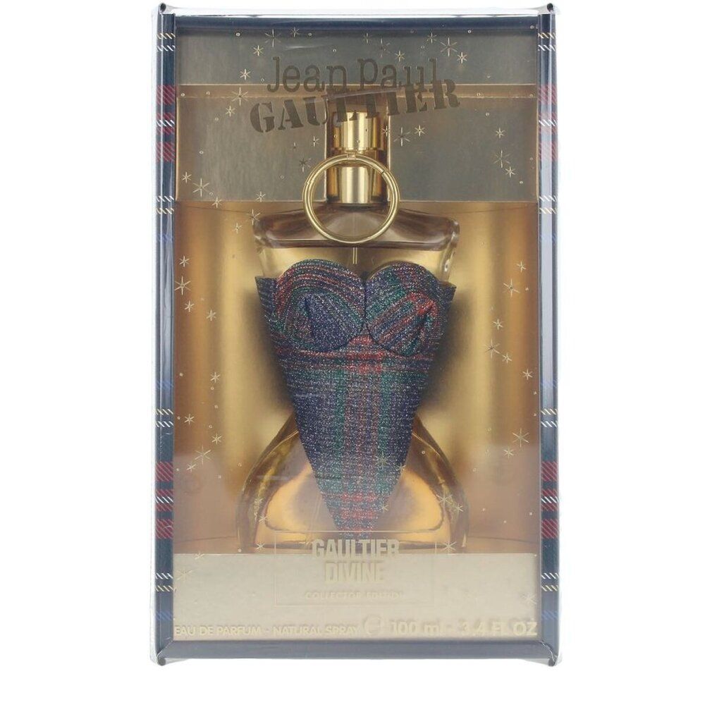 Flacone di profumo in confezione regalo. Flacone a forma di corsetto con motivo tartan blu-verde. Dettagli dorati. Marchio e nome del prodotto visibili.