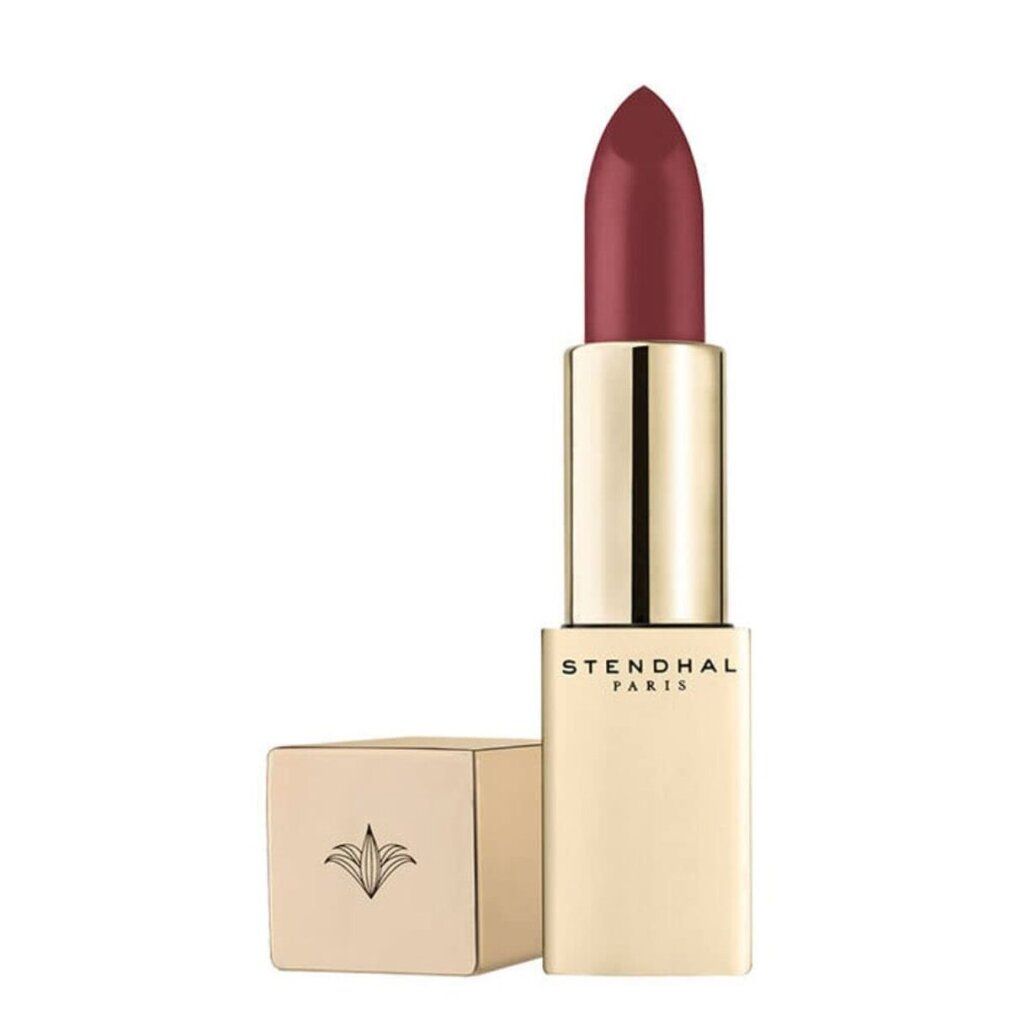 Rossetto rosso in astuccio dorato. Il cappuccio è accanto. Marchio "STENDHAL PARIS" visibile sull'astuccio.