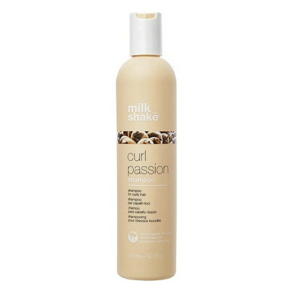 Flacone di shampoo beige con tappo bianco. Scritta: milk_shake, curl passion shampoo. Per capelli ricci.