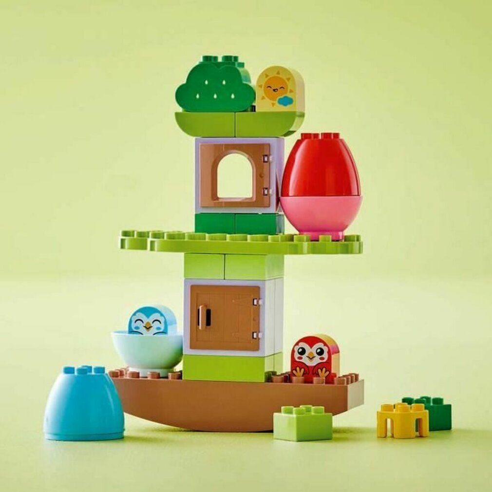 LEGO DUPLO 10440. Il set include un albero da bilanciare e impilare con elementi colorati e personaggi.