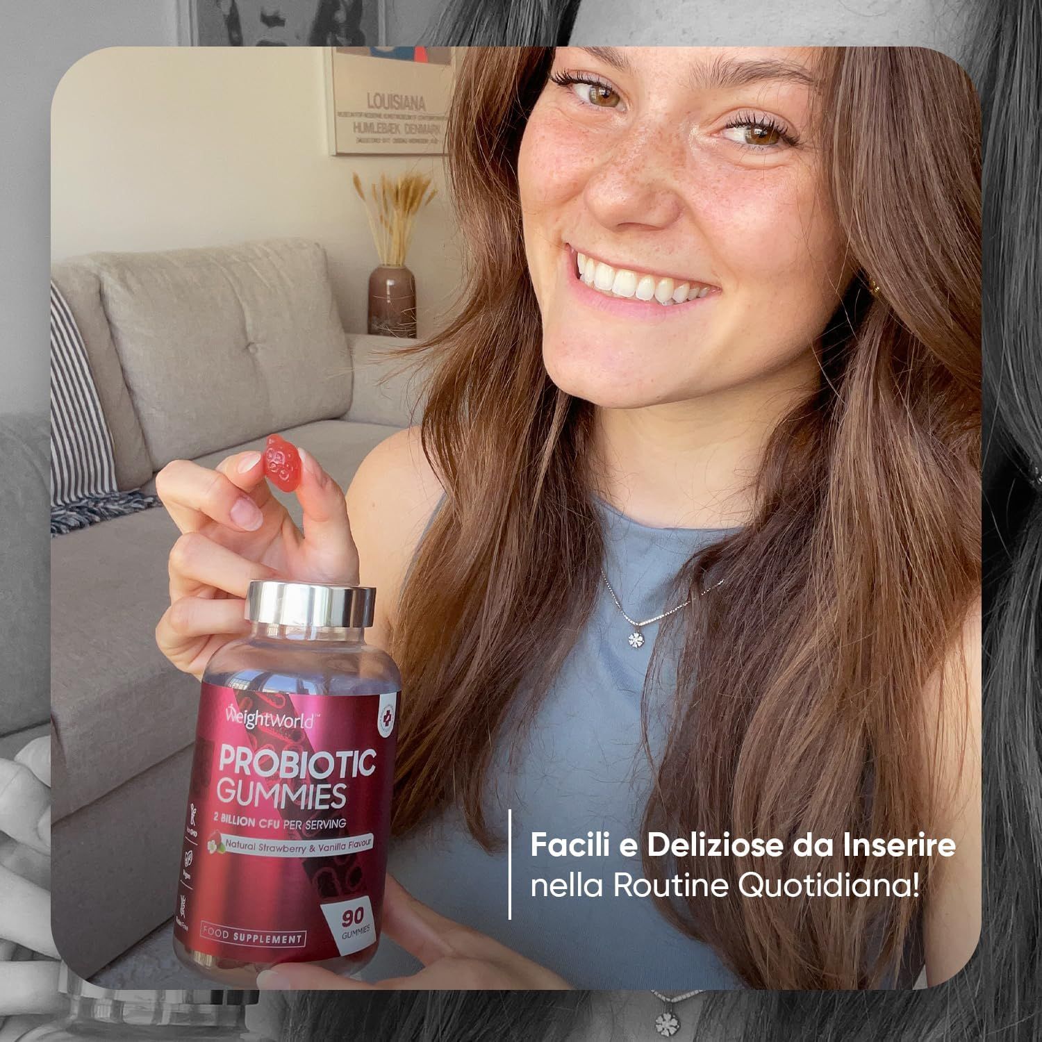 Donna tiene un pacco di caramelle gommose. Testo: Probiotika Gummibärchen. Testo: 2 miliardi di UFC. Testo: 90 caramelle gommose. Facile e delizioso.