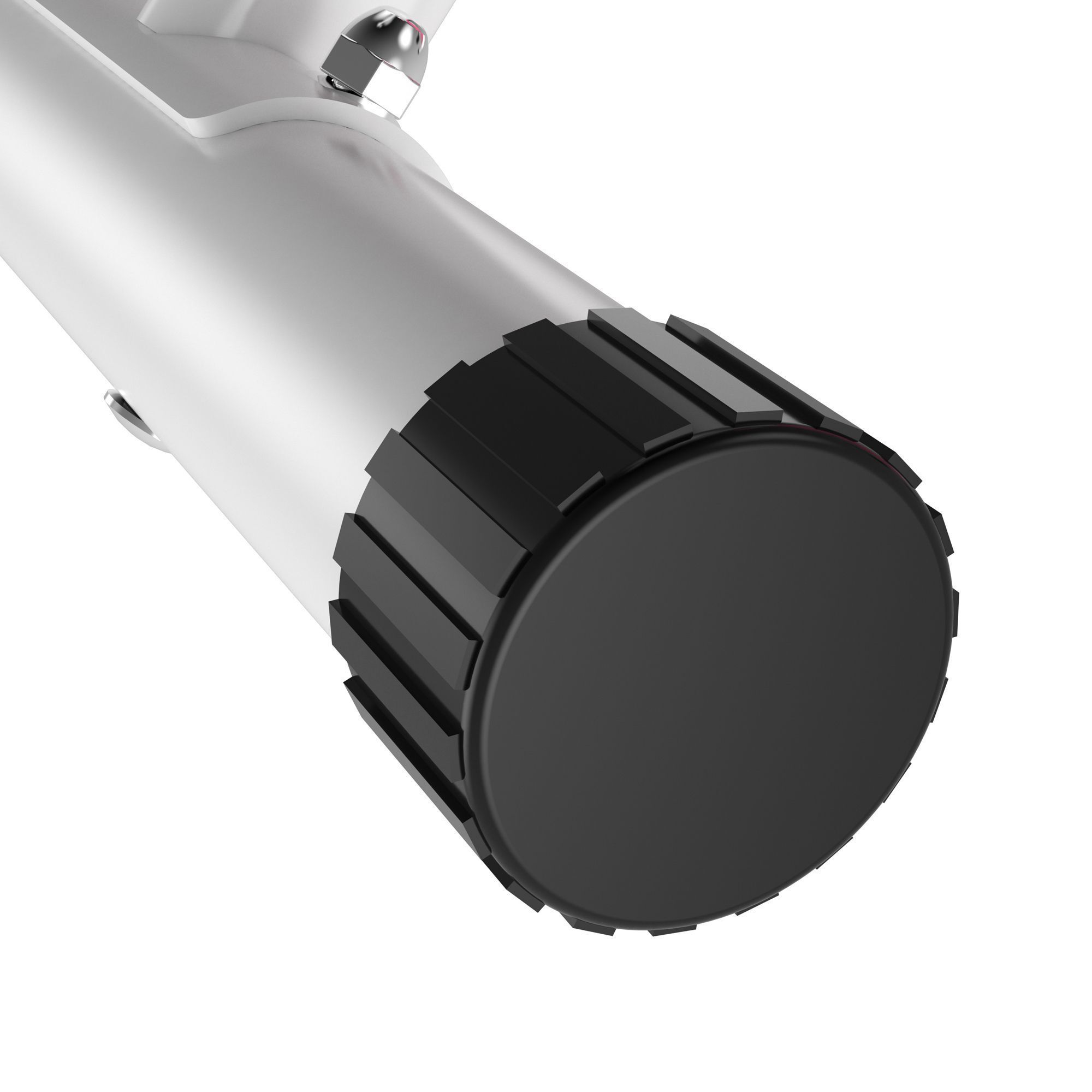 Primo piano del piede nero e scanalato di una cyclette. Forma rotonda con tampone in gomma nera.