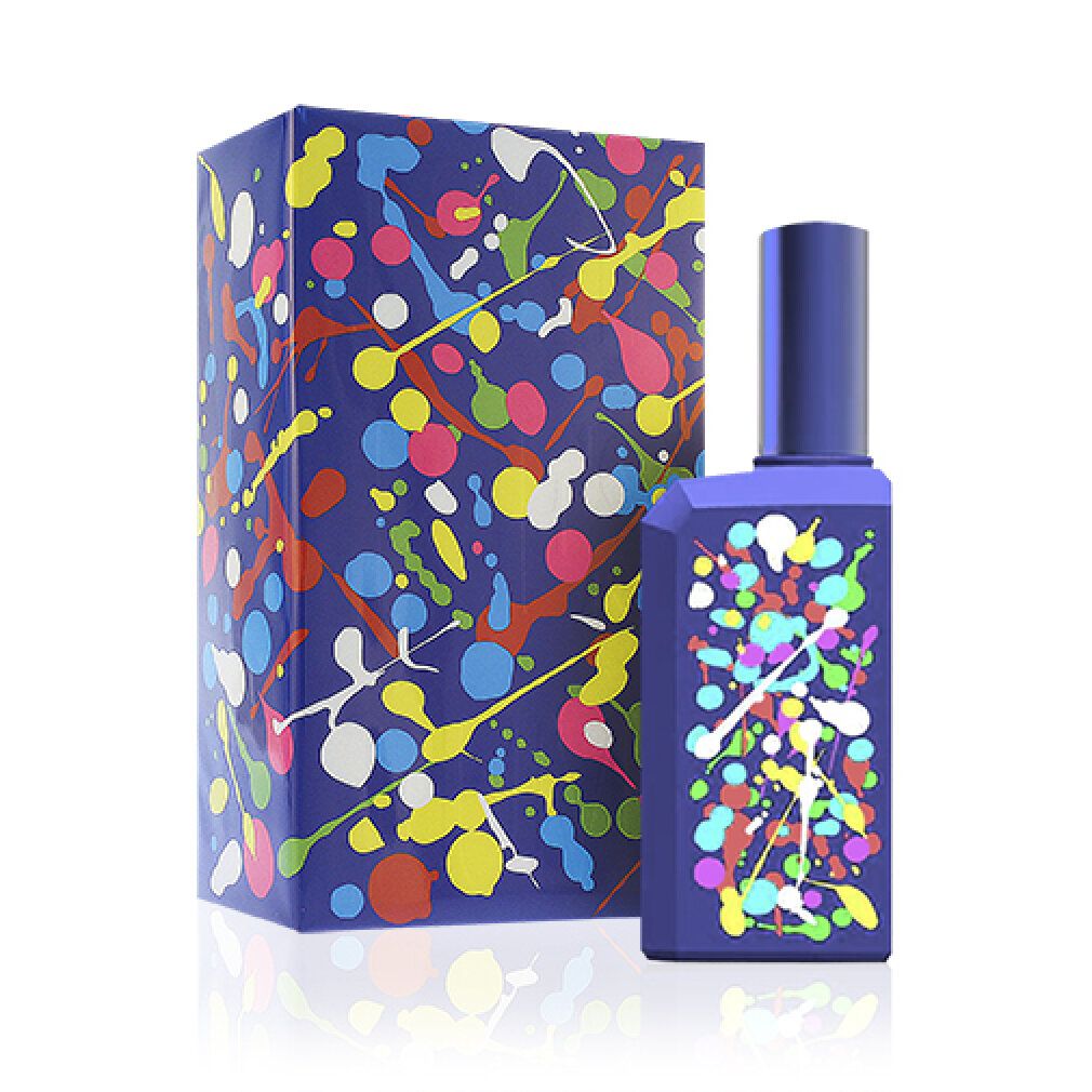 Flacone e scatola di profumo blu con schizzi di vernice. Flacone rettangolare, con tappo. Scatola accanto.