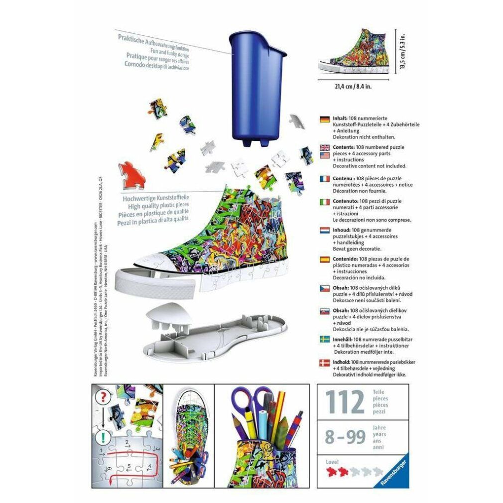 Puzzle Sneaker Graffiti con pezzi. Contiene 108 pezzi, accessori. Supporto blu. Dimensioni: 21,4 cm x 8,4 in. Ravensburger.